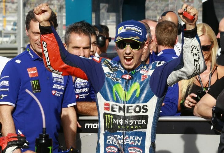 Jorge Lorenzo celebrated the pole at Valencia in his final race with Yamaha.