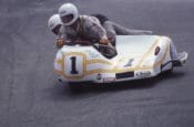 Driver Pete Essaff and passenger Dennis Cruegar race in the AMA National Sidecar race at Laguna Seca Raceway in July of 1983.