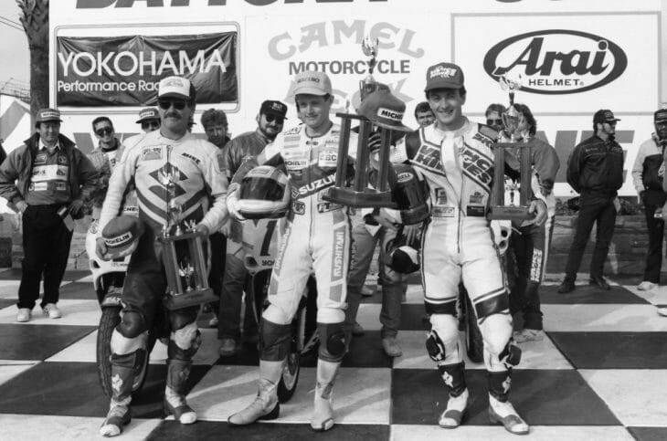 Caption: Jamie James (center) in the winner’s circle at Daytona after winning his first AMA Pro event, the ’89 Daytona 750cc Supersport race over second-place David Sadowski (right) and third-place Mike Harth (right). (Henny Abrams photo)