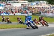 Doug Henry leads the start of the 2005 AMA Supermoto Championship race at Waterford Hills Road Racing Course in Clarkston, Michigan.
