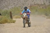 After several years of trying, Francisco Arredondo and teammates Shane Esposito, Justin Morgan and Roberto Villalobos enjoyed a trouble-free day to get their first overall SCORE Baja motorcycle victory.