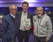 Pictured presenting Glover his award is F.I.M. President Vito Ippolito (left) and Youthstream President, Giuseppe Luongo (right).