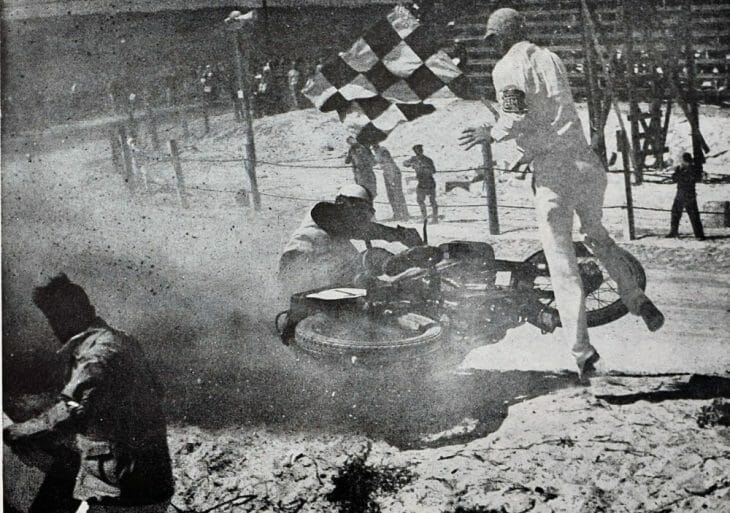 Starter Jim Davis is hit at the finish of the 1948 Daytona 100-Mile Amatuer race by Don Evans. (Photo by C.W. Galbreath)