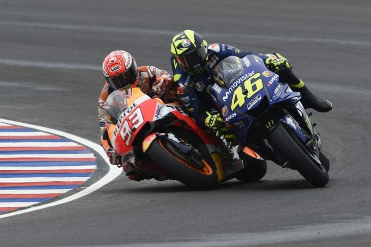 Marc Marquez and Valentino Rossi make contact at the 2018 MotoGP in Argentina