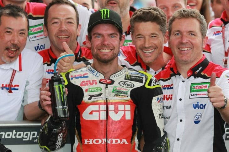 Cal Crutchlow celebrates with his LCR Honda team after his victory at the 2018 Argentine Grand Prix