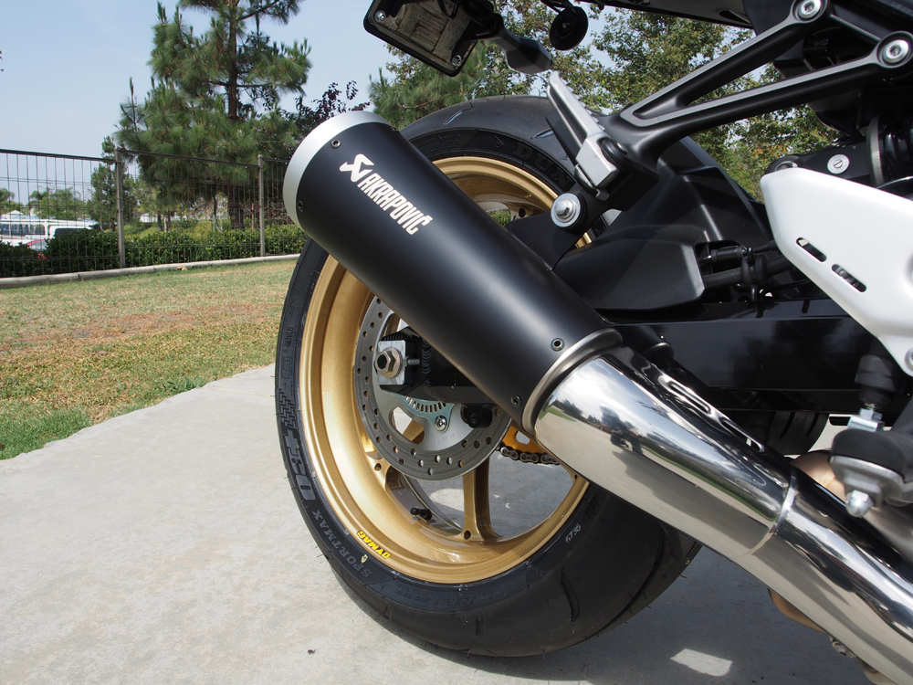 The new Akrapovic titanium muffler looks better in the metal than in photos. Sounds better, too.
