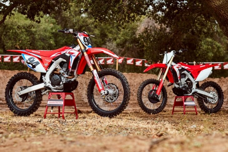 The 2019 Honda CRF450RWE (left) and CRF450R (right).