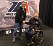 AMA President and CEO Rob Dingman and MotoAmerica President Wayne Rainey shake on a deal that will keep the AMA Superbike Championship and MotoAmerica together through the 2029 season.