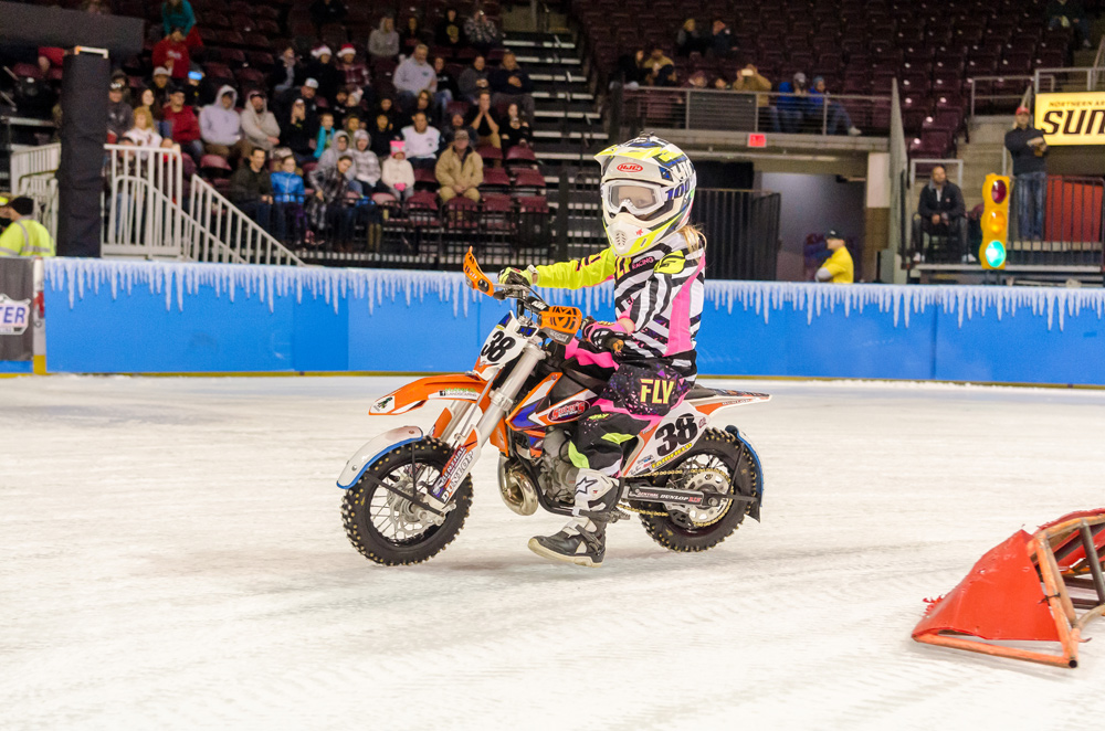 Cassie Fairfield races around the ice on her specialized KTM 65cc.