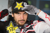 Jason Anderson putting his hat on during the 2019 Anaheim Supercross.