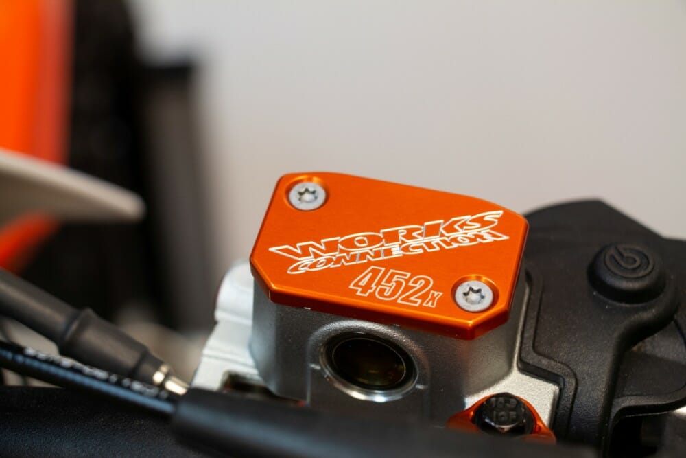 Works Connection is now offering an affordable option for customizing its front brake and clutch caps with your rider number. 