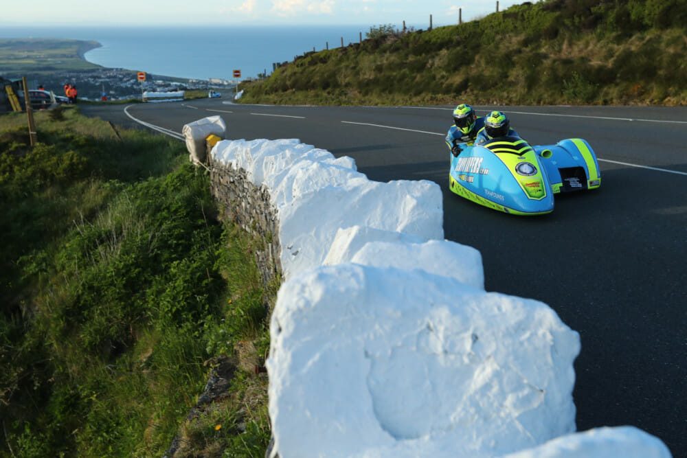 After the rain on Monday, qualifying for the 2019 Isle of Man TT Races fuelled by Monster Energy resumed on Tuesday evening with the Sidecars getting their first outing on the TT Mountain Course this year