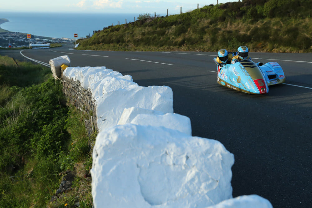 After the rain on Monday, qualifying for the 2019 Isle of Man TT Races fuelled by Monster Energy resumed on Tuesday evening with the Sidecars getting their first outing on the TT Mountain Course this year