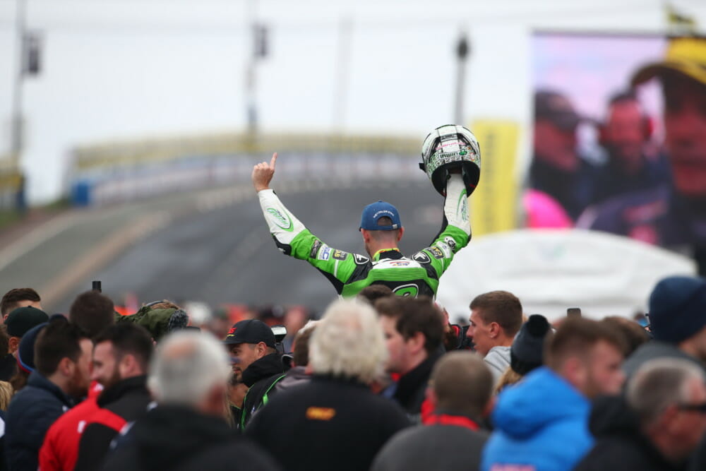 Glenn Irwin celebrates victory.