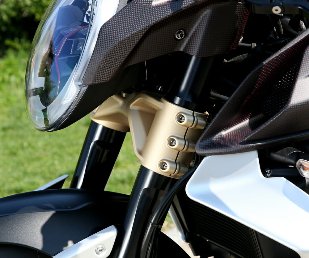 Everywhere you look, there are beautiful touches on the 2020 MV Agusta Brutale 1000 Prototype. Check out this gold triple clamp and the red weave in the carbon fiber.