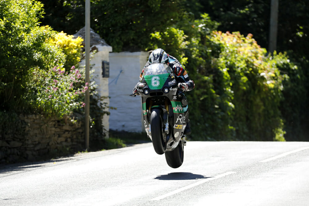 Michael Dunlop goes ‘full send’ on the Paton on his way to the 2018 Lightweight TT win.