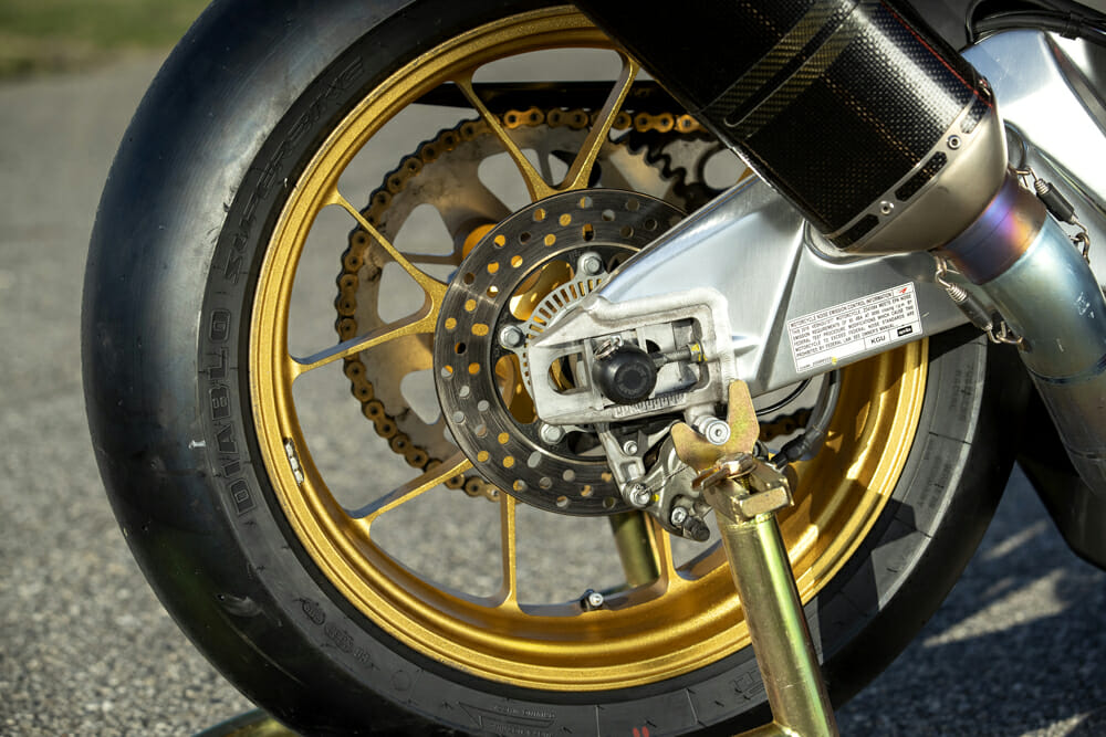 The gold wheels on the Pikes Peak-Winning Aprilia Tuono 1100 RSV Factory bike came from an RSV4 RF from 2014.