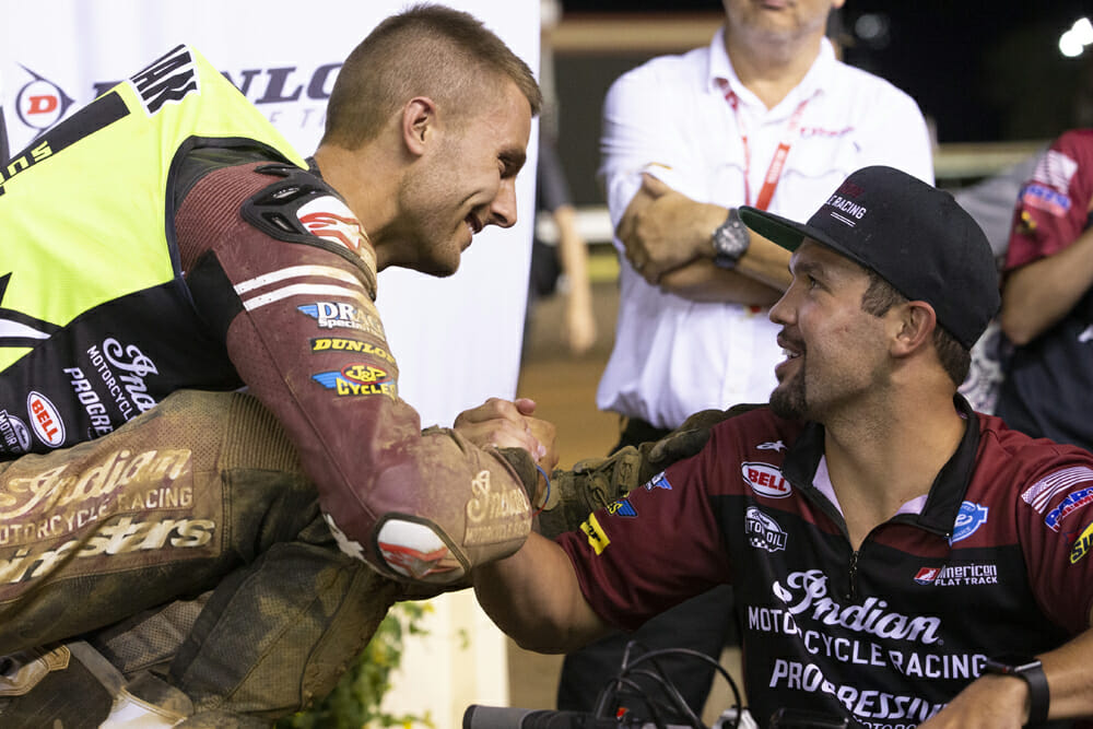 Briar Bauman (left) celebrates with rider coach Brad Baker (right) in Minnesota. 