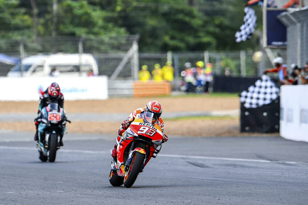 Title number eight across all classes was sealed for Marc Marquez with a last corner victory over Fabio Quartararo in Thailand.