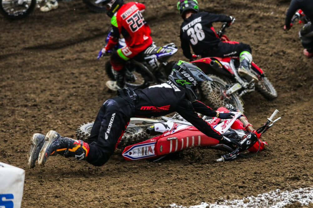 Phoenix Racing Team Honda rider Jace Owen crashes during Round Nine 250 Pro Sport Main.