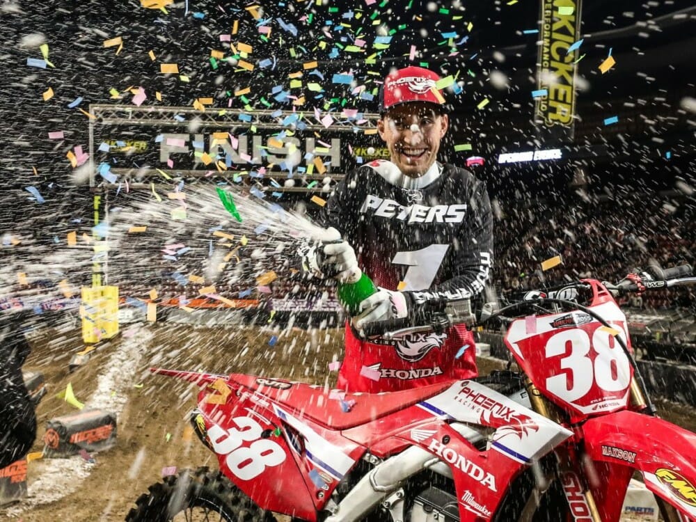 Phoenix Racing Honda Team rider Kyle Peters celebrating winning the 2020 AMA Arenacross National Championship title, Saturday night in Salt Lake City.