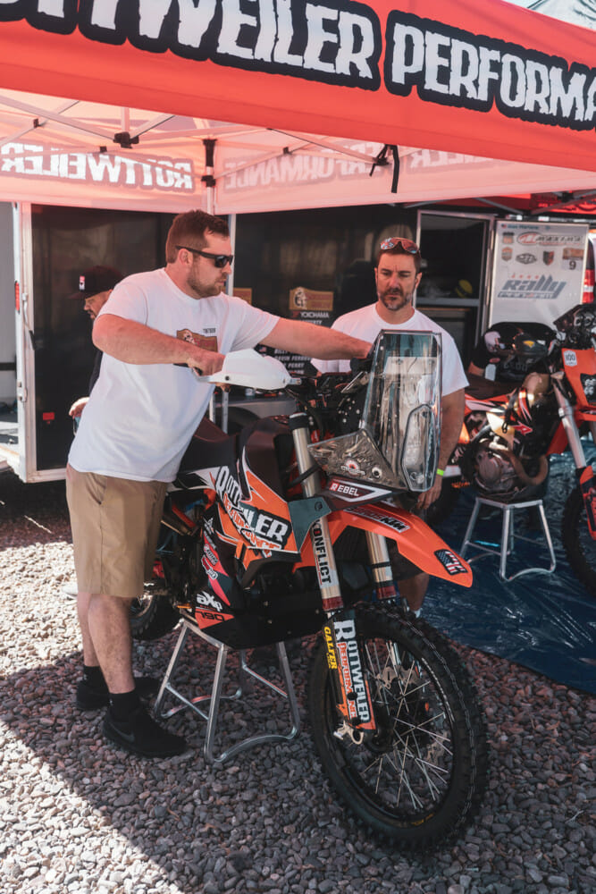 Wes Vannieuwenhuise (left) and bike builder Chris Parker get ready for another Sonora stage.