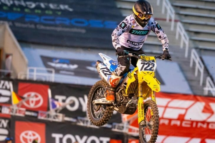 Adam Enticknap (#722) soars over the Salt Lake City track on his Suzuki RM-Z450