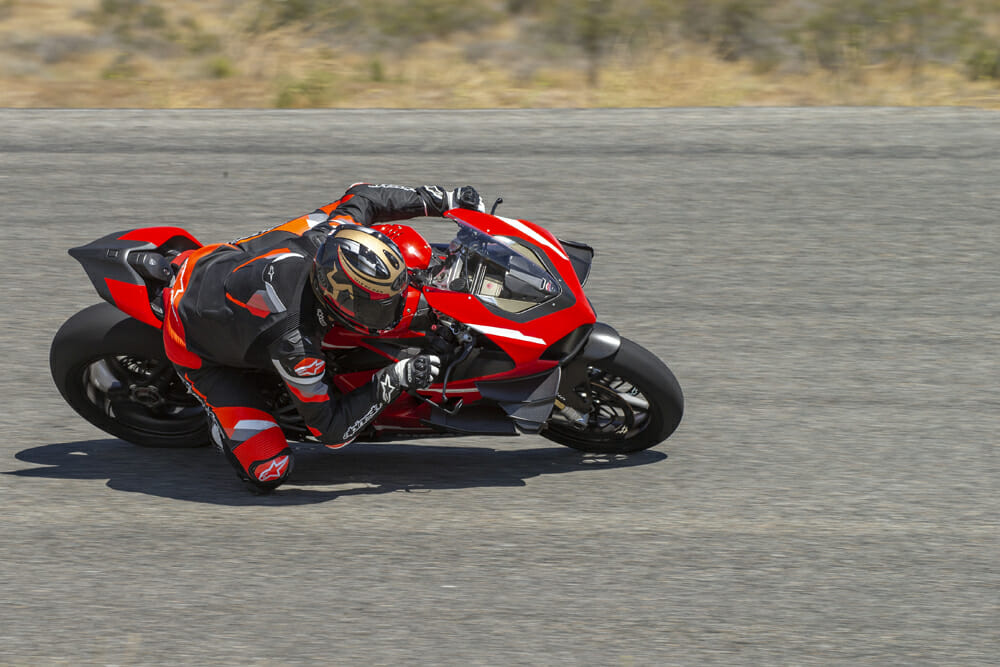 A 2020 Ducati Superleggera V4 at full lean on the racetrack.