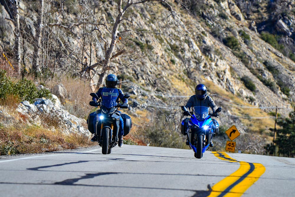 2024 Suzuki GSX-S1000GT+ (right) and 2024 Yamaha Tracer 9 GT+ front view 2024 Suzuki GSX-S1000GT+ (right) and 2024 Yamaha Tracer 9 GT+ front view