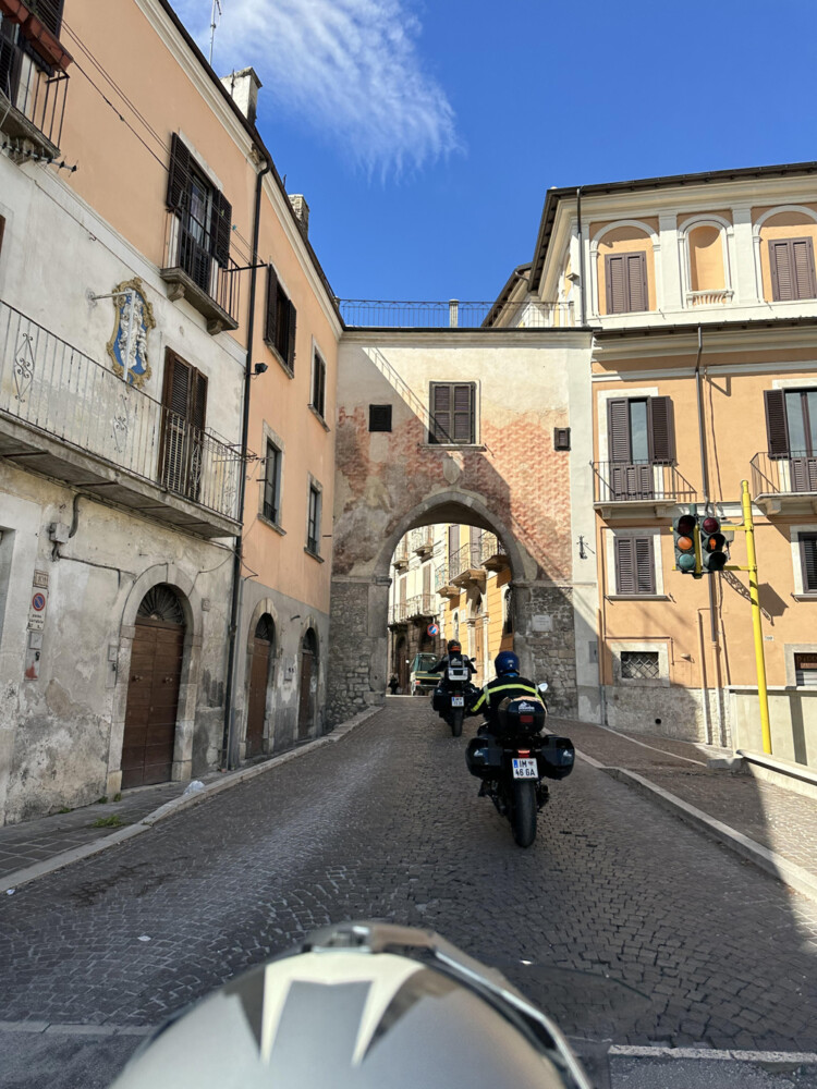 Edelweiss motorcycle tour cobblestone road in an Italian village