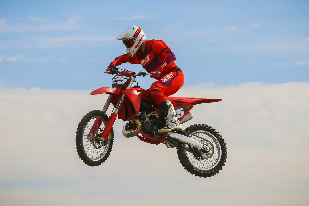 2025 GasGas MC 300 jumping 2025 GasGas MC 300 jumping left side