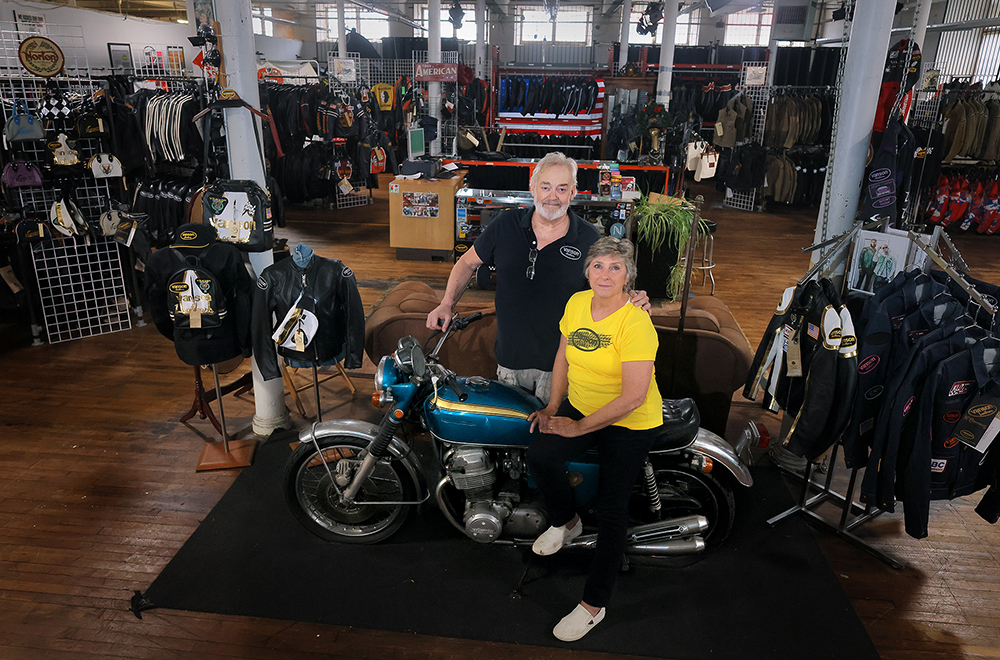 Kim & Mike Van Der Sleesen in the Vanson showroom with a 1969 Honda CV750 in New Bedford, Massachusetts. Photo by Lane Turner of the Boston Globe/courtesy Vanson