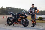 Tyler Scott wearing an RST race suit featuring D3O protection