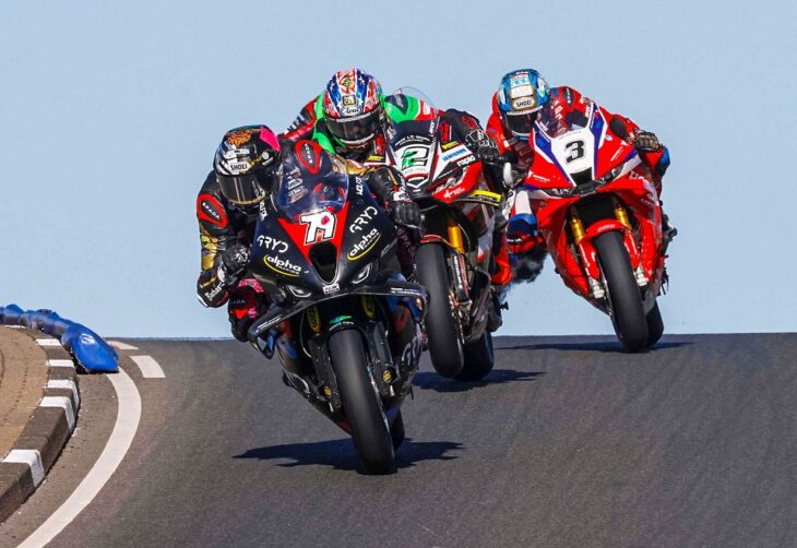 Rod Neill/Pacemaker Press 09/05/2026: Storm Stacey (CD Racing Alpha Racing BMW) leads the pack at Black Hill during the Merrow Hotel and Spa Superbike race at the Briggs Equipment NW200 on Saturday. Photo by Rod Neill/Pacemaker Press