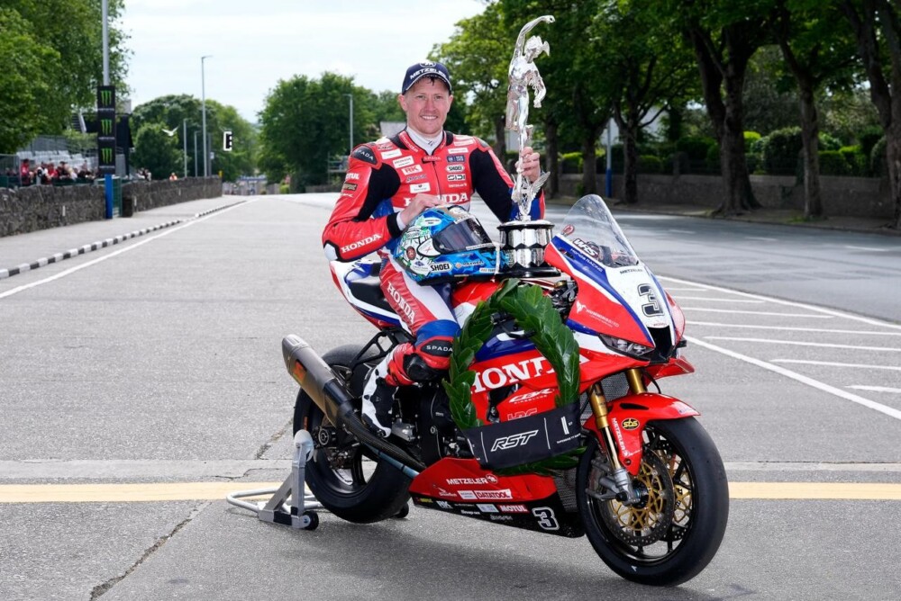 Dean Harrison celebrating his victory in the RST Superbike race at the 2026 Isle of Man TT