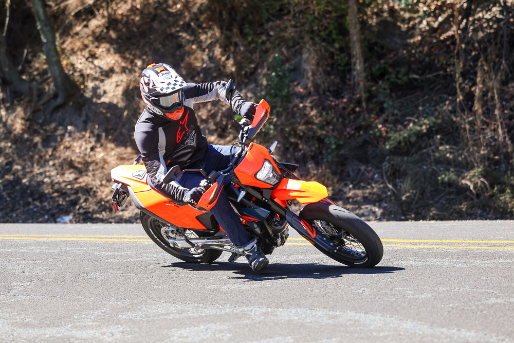 2026 KTM 690 SMC R action right side 2026 KTM 690 SMC R action right side