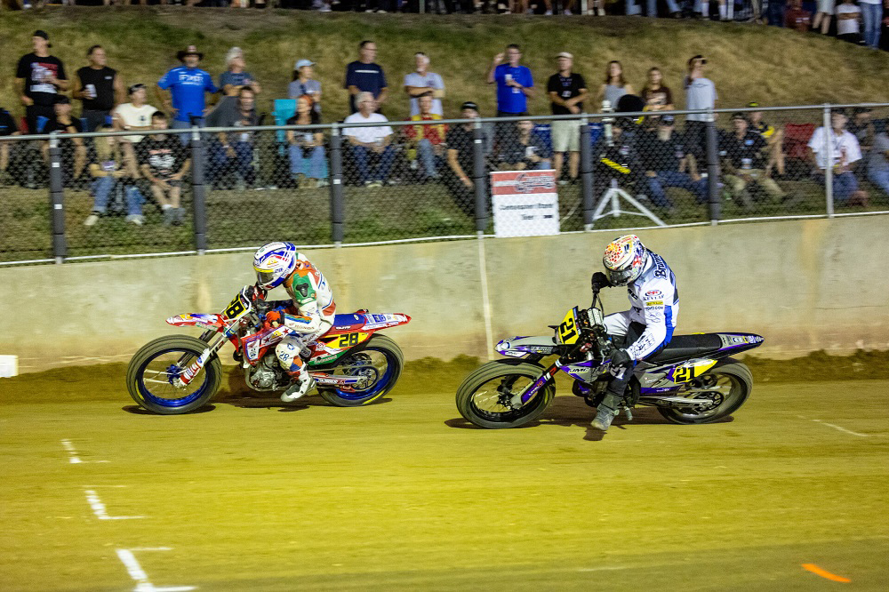 Kage Tadman (28) and Trevor Brunner (21) at Jackpine Gypsies Short Track. Photo Tim Lester for AMA Pro Racing